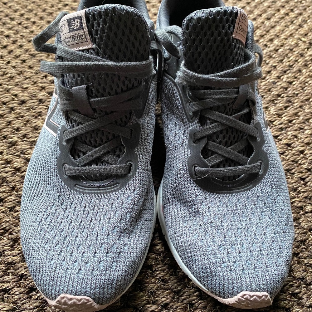 New Balance snickers in grey color with light pinks accents.  Size 8